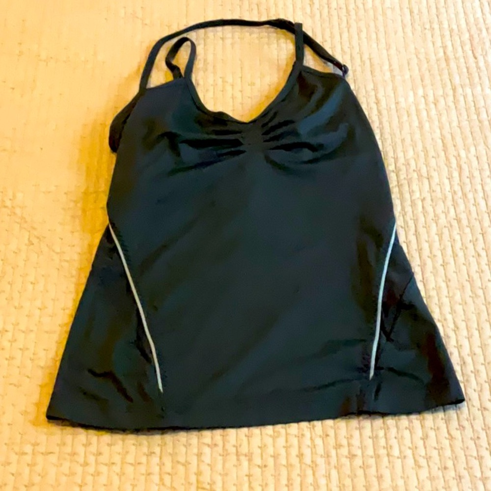 Flattering Stella McCartney, black/gray accented workout tank, built-in bra.